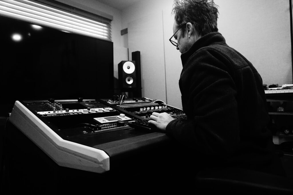 James Driscoll working at the mastering desk at Hot Tonic Mastering